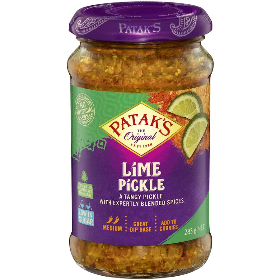 Tangy Patak's Pickle Lime Medium, made with juicy limes and spices, perfect for enhancing Indian dishes and dips.