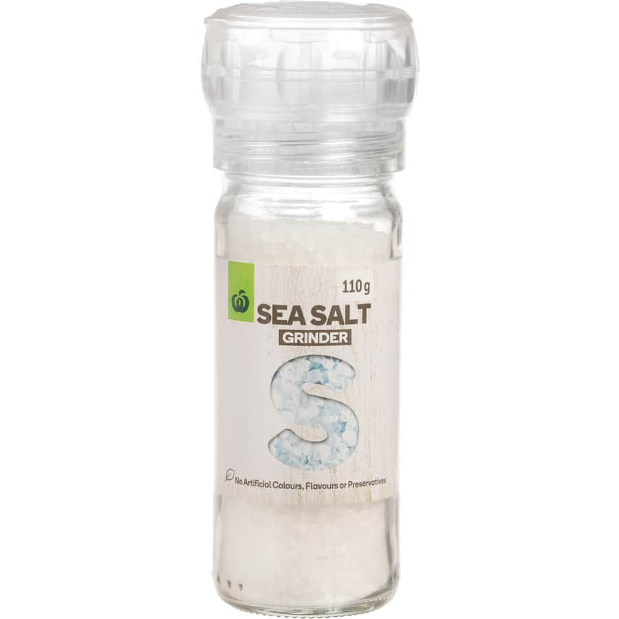 Woolworths Sea Salt in a grinder, unrefined, mineral-rich seasoning for enhancing dishes without artificial additives.