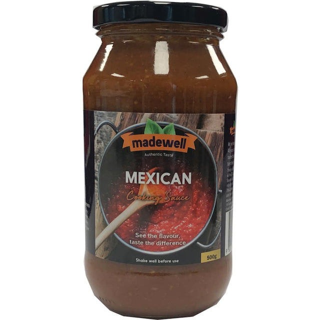 Madewell Cooking Sauce Mexican in a deep red-brown hue, infused with spices and tomato, perfect for authentic Mexican dishes.