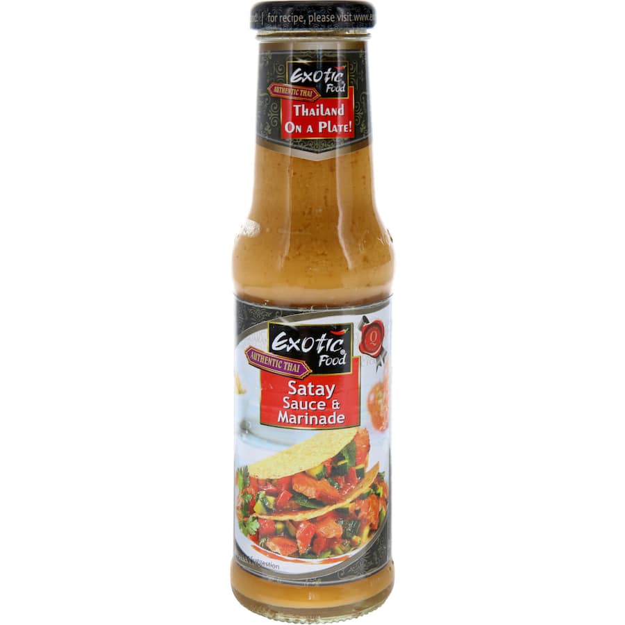 A jar of Exotic Food Asian Satay Sauce made with peanuts and spices, perfect for marinating, dipping, and stir-frying.