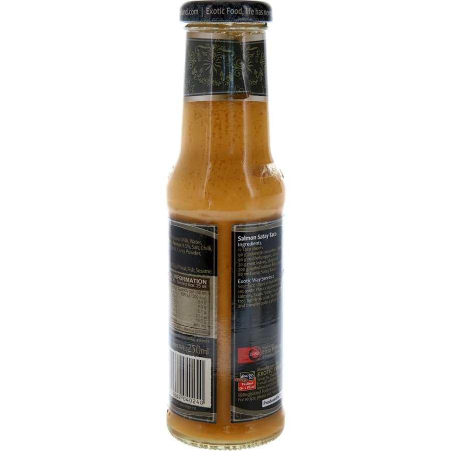 A jar of Exotic Food Asian Satay Sauce featuring a blend of peanuts and spices, ideal for marinating and dipping.