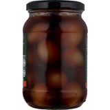 Delmaine Pickled Onions in a jar, featuring large crunchy onions in dark sweet and sour marinade, perfect for meals and charcuterie.