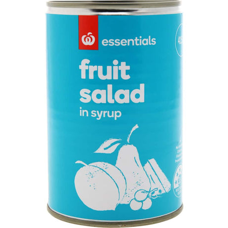 Essentials Fruit Salad in Syrup: A 415g can of peaches, pears, pineapple, and grapes in a sweet syrup, perfect for snacking or recipes.