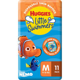 Huggies Little Swimmers Medium swimpants feature Nemo prints, absorbent materials, leak guards, and stretchy sides for comfort in water.