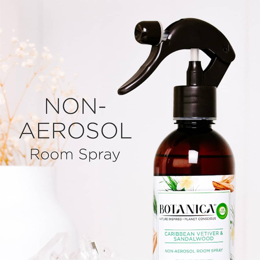 Air Wick Botanica Room Spray with Caribbean Vetiver & Sandalwood, a non-aerosol air freshener infused with essential oils.