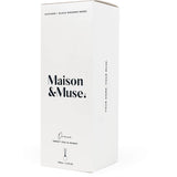 Maison & Muse diffuser featuring Sweet Pea & Peony scent in a sleek, recyclable glass decanter for elegant home fragrance.