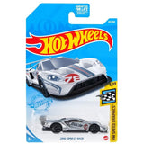 Colorful assortment of 1:64 scale die-cast Hot Wheels vehicles, perfect for play and collecting, featuring realistic designs.