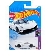 Assorted Hot Wheels die-cast vehicles in vibrant colors and authentic 1:64 scale designs for kids and collectors.