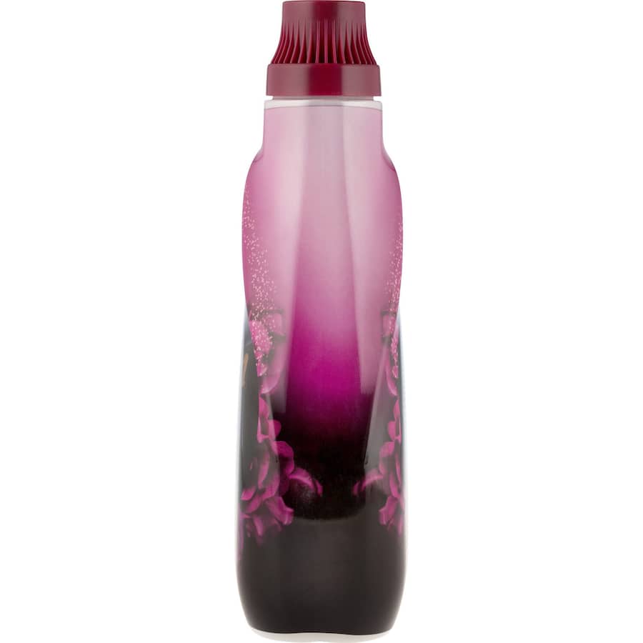 Elegant Night fabric softener enriches laundry with luxurious softness and lasting fragrance, perfect for all fabrics.