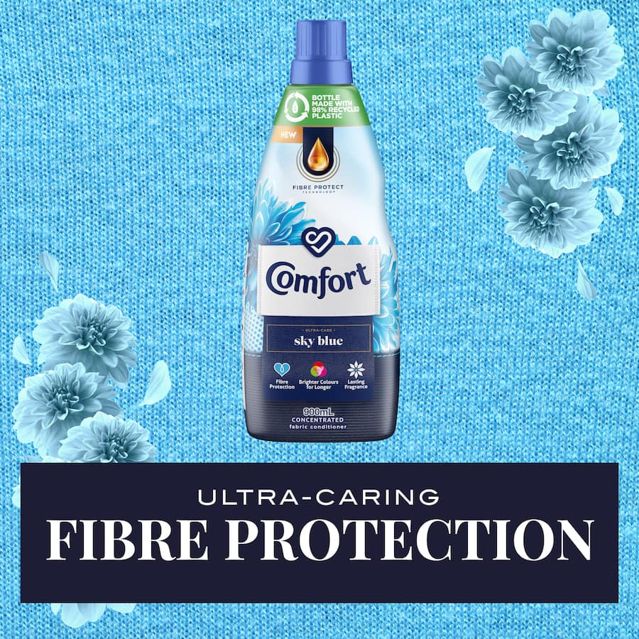 Sky blue bottle of Comfort Fabric Softener Conditioner, enhancing softness and freshness while protecting colors and fibers.