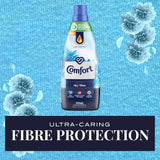 Sky blue bottle of Comfort Fabric Softener Conditioner, enhancing softness and freshness while protecting colors and fibers.