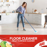 Ajax Floor Cleaner in a 750mL recycled bottle, featuring baking soda for effective, eco-friendly cleaning of stone surfaces.