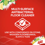 Ajax Floor Cleaner in a 100% recycled bottle, safe for stone surfaces, removes grease and grime with refreshing baking soda scent.