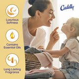 Cuddly Aroma Collections Fabric Softener in Energising Citrus, softening laundry with invigorating citrus scent and reducing static cling.
