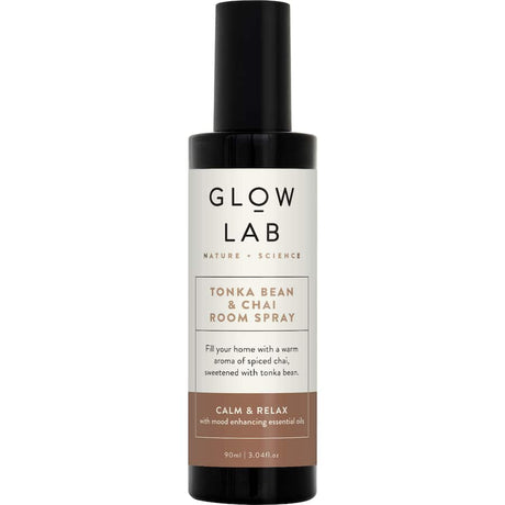 Elegant glass bottle of Glow Lab Air Freshener Room Spray, blending Tonka Bean and Chai for a calm, inviting atmosphere.