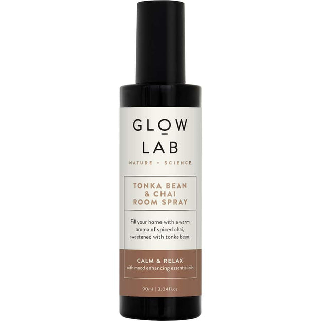 Elegant glass bottle of Glow Lab Air Freshener Room Spray, blending Tonka Bean and Chai for a calm, inviting atmosphere.
