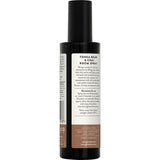 Glow Lab Air Freshener in a matte black glass bottle, featuring a calming Tonka Bean & Chai scent blend, alcohol-free.