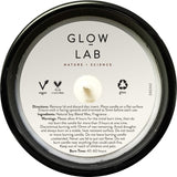 Glow Lab Coconut & Sandalwood candle in dark glass, natural soy wax, rich tropical aroma, burns 40-60 hours for relaxation.