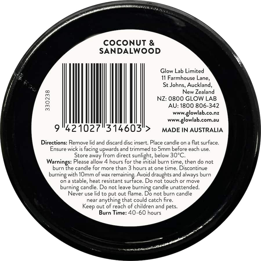 Glow Lab Coconut & Sandalwood candle in a dark glass vessel, featuring tropical scents and 40-60 hours burn time for relaxation.