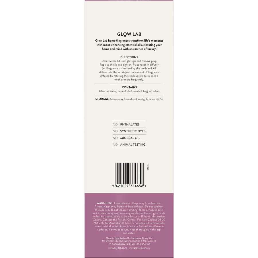 Glow Lab Reed Diffuser in dark glass, featuring warm Vanilla, Forest Berry, and orange notes for a cozy home ambiance.