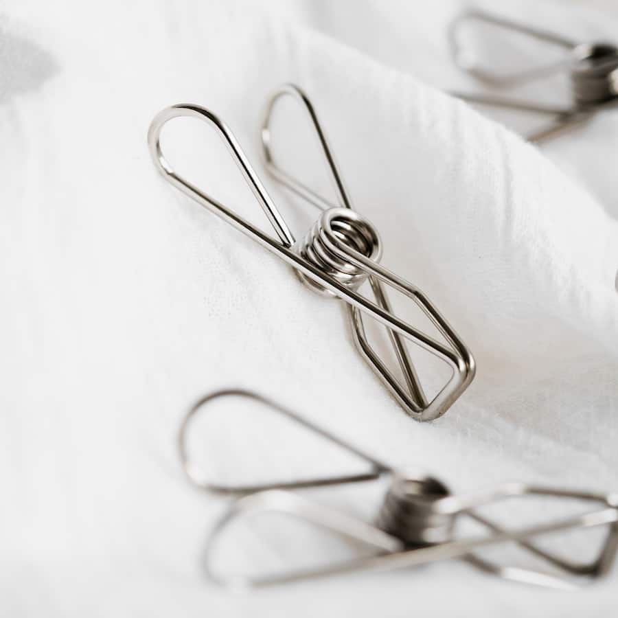 Durable Seymours stainless steel clothes pegs with a strong grip, rust-resistant and eco-friendly for reliable laundry drying.
