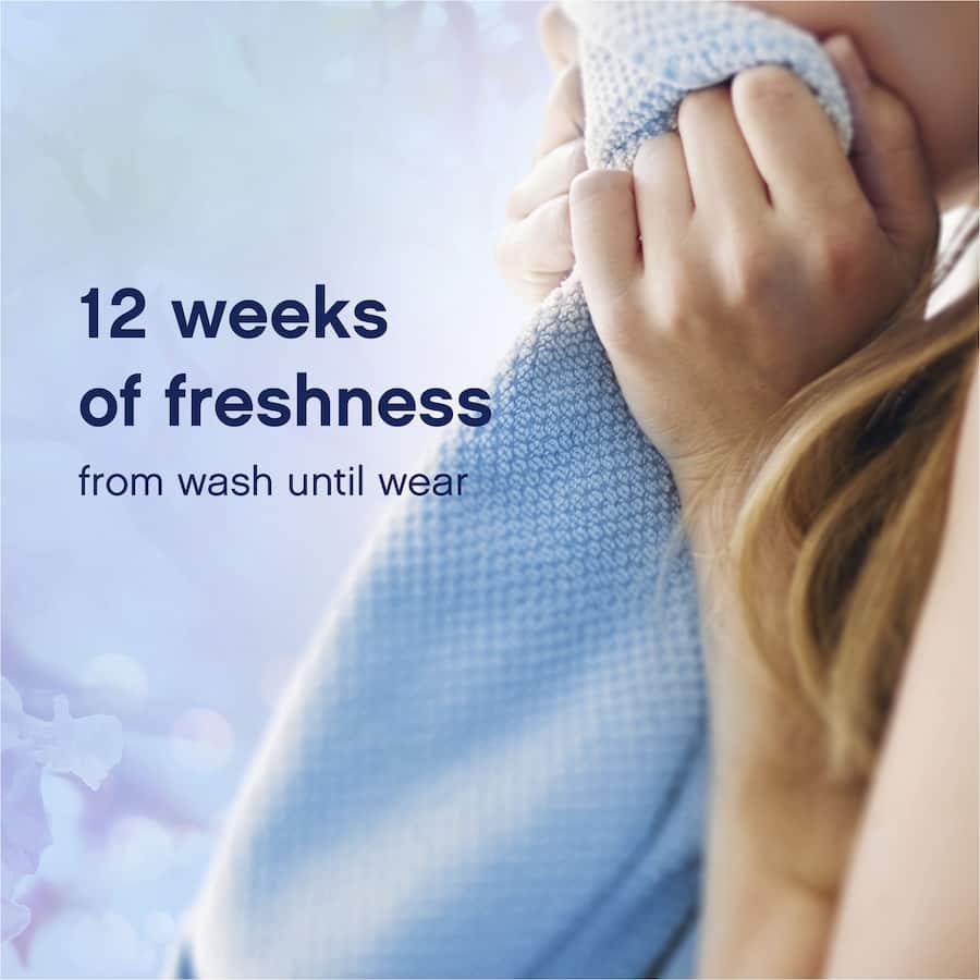 Downy Laundry Fragrance Booster April Fresh enhances laundry with long-lasting floral scents, keeping clothes fresh and vibrant.