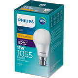 Philips 11W Bayonet LED Light Bulb emitting 1055 lumens of warm white light for energy-efficient indoor lighting.