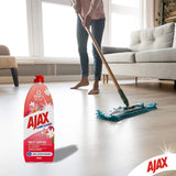 Ajax Floor Cleaner Divine Blends: effective cleaner for all floors, tough on dirt, with a refreshing tropical breeze scent.