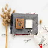 Eco-friendly Munch Laundry Soap Unscented in a plastic bottle, perfect for sensitive skin and tough on stains.