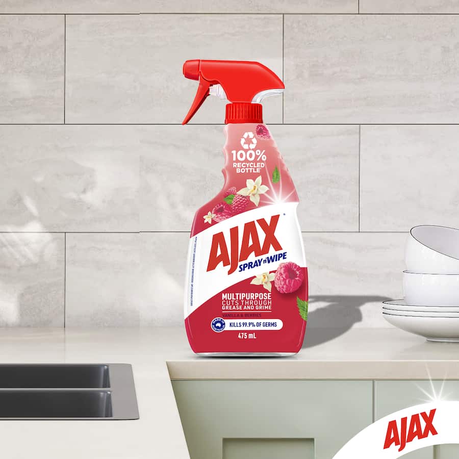 Ajax Spray N Wipe in Vanilla & Berries scent, eco-friendly cleaner for kitchens and bathrooms in a 475mL recycled bottle.