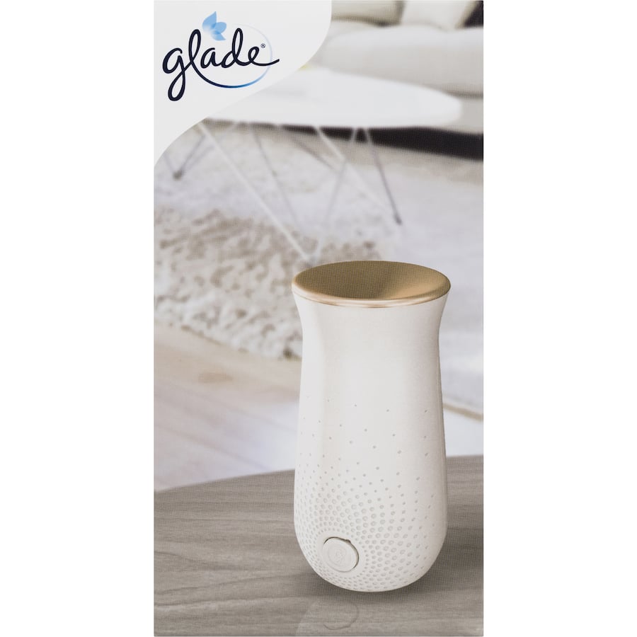 Glade Sense & Spray: automatic vanilla air freshener with motion sensor, sleek design, and essential oils for instant fragrance.