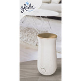 Glade Sense & Spray: automatic vanilla air freshener with motion sensor, sleek design, and essential oils for instant fragrance.