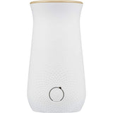Motion-activated Glade Vanilla spray system enhances ambiance with essential oils, integrating seamlessly into home decor.