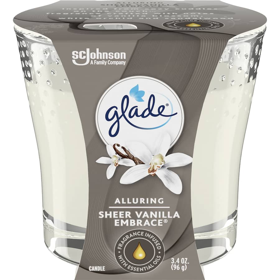 Glade Sheer Vanilla Embrace candle in a sleek jar, offering a warm blend of vanilla, orchid, and sandalwood fragrances.