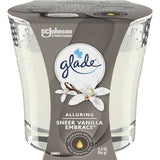 Glade Sheer Vanilla Embrace candle in a sleek jar, offering a warm blend of vanilla, orchid, and sandalwood fragrances.