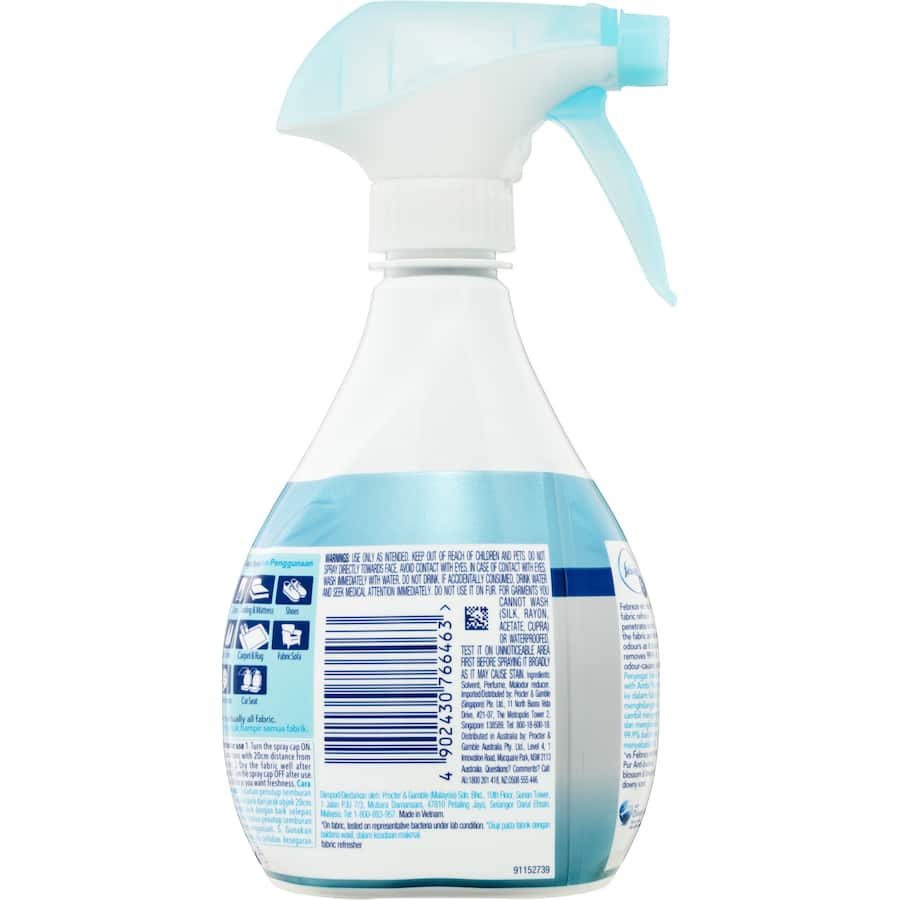 Febreze Fabric Freshener Extra Strength bottle, designed to eliminate tough odors and refresh fabrics with advanced OdourClear technology.