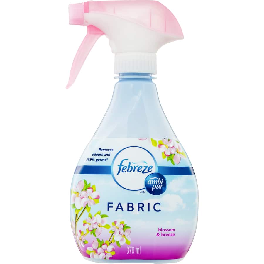 Febreze Fabric Freshener in Blossom & Breeze scent, designed to eliminate odours and freshen fabrics effectively.