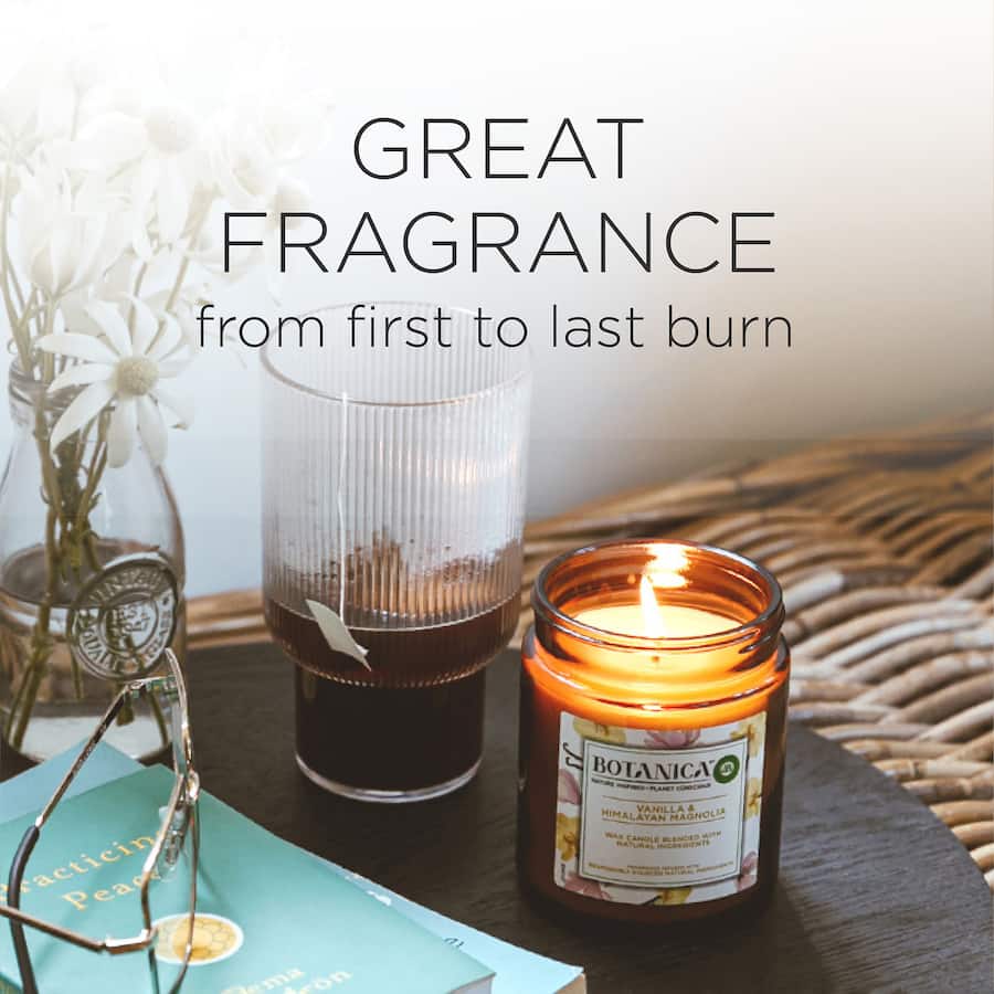 Air Wick Botanica scented candle in Vanilla & Himalaya Magnolia, featuring essential oils, sustainable wax, and lasting fragrance.