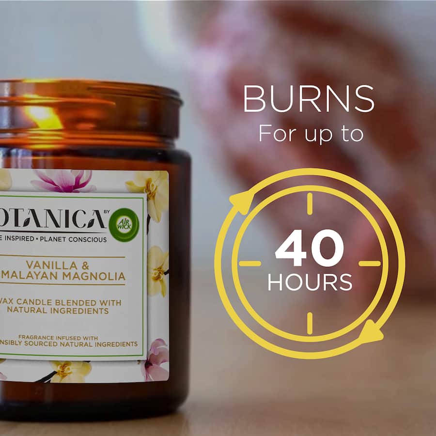 Air Wick Botanica scented candle in Vanilla & Himalaya Magnolia, featuring natural ingredients and a captivating aroma.