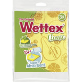 Super absorbent Wettex cleaning cloths in yellow, pink, and green; eco-friendly, biodegradable, perfect for versatile cleaning.