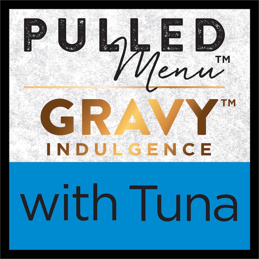 Dine Pulled Menu Wet Cat Food with Tuna, featuring tender tuna shreds in rich gravy, offers a delicious and nutritious meal for cats.