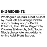 Optimum Small Breed Dry Dog Food featuring chicken, vegetables, and rice, designed for balanced nutrition and urinary health.