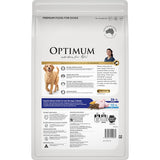 Optimum Dry Dog Food featuring chicken, vegetables, and rice offers a complete, nutritious meal for your dog's health and vitality.