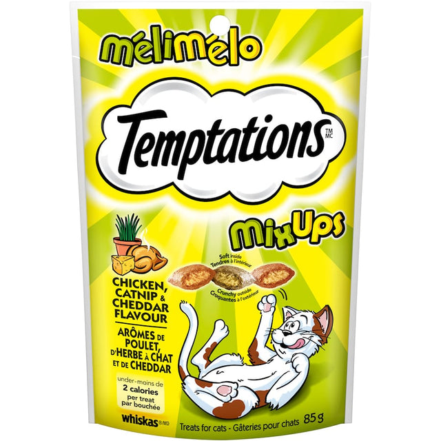 Temptations cat treats featuring chicken, catnip, and cheddar in a crunchy shell with a soft center, perfect for rewarding your kitty.