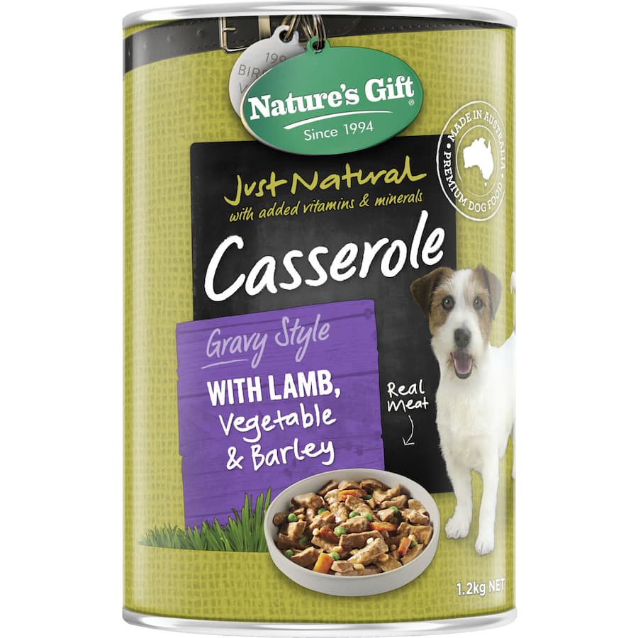 A can of Nature's Gift Wet Dog Food featuring lamb, vegetables, and barley, promoting a nutritious and tasty meal for dogs.