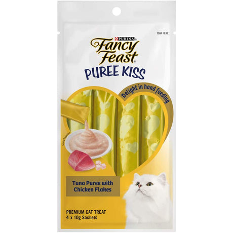 Fancy Feast Puree Kiss Cat Treats with tuna and chicken flakes, perfect for pampering and enhancing mealtime for your cat.