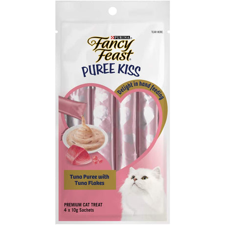 Creamy tuna flake cat treats designed for pampering and elevating mealtime experiences.