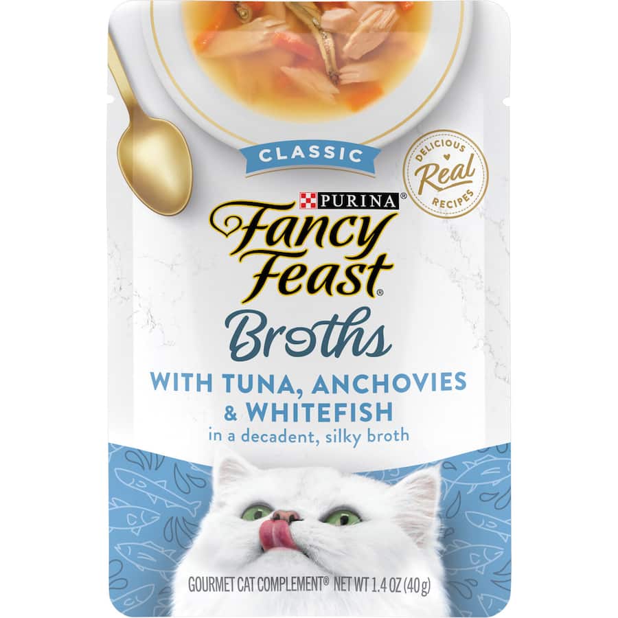 Delicious Fancy Feast Broths with real tuna, anchovy, and white fish in silky broth for a gourmet cat treat.