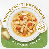 Gourmet cat food featuring tender chicken and vegetables in a rich broth, free from artificial ingredients and fillers.