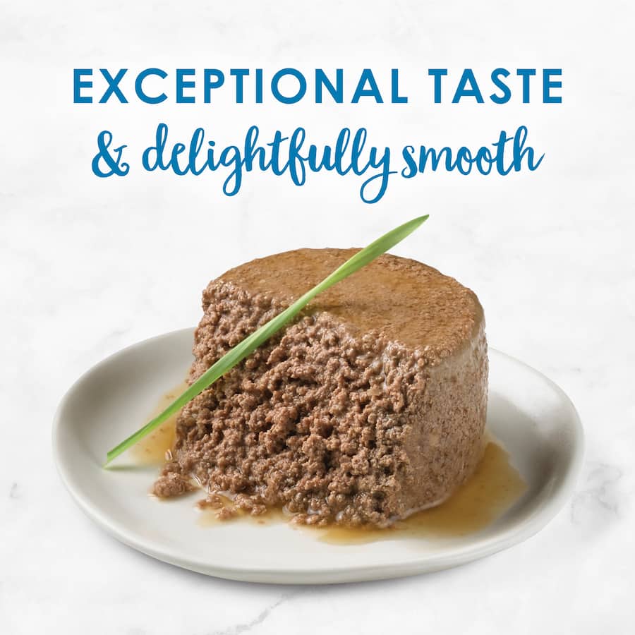 Delicious Fancy Feast wet cat food with ocean whitefish and tuna in smooth pâté, designed for a gourmet feline dining experience.